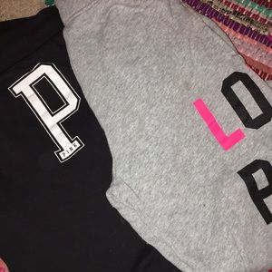 Two woman’s Victoria secret PINK sweats.